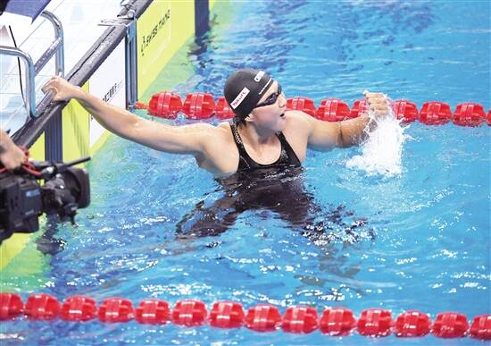 王简嘉禾破女子1500米自由泳亚洲纪录.      新华社发